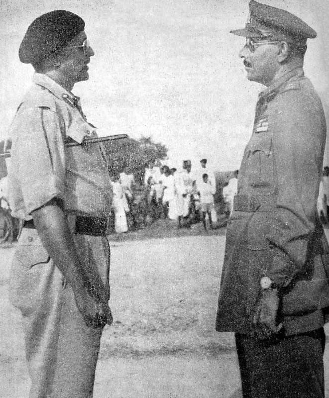 Major General Syed Ahmed El Edroos (at right) offers his surrender of the Hyderabad State Forces to Major General (later General and Army Chief) Joyanto Nath Chaudhuri at Secunderabad